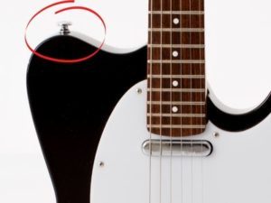exemple de straplock sur une guitare électrique.